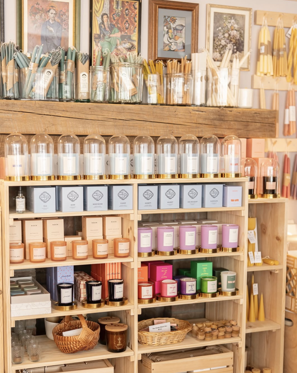 Candles and artwork on display at Golden Rule Gallery in Excelsior